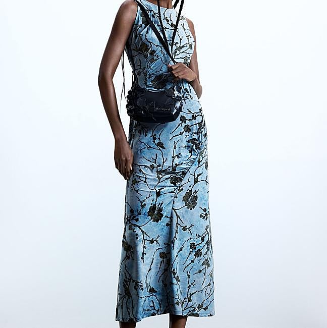 Printed Capri blue dress by Desigual, €99.95.