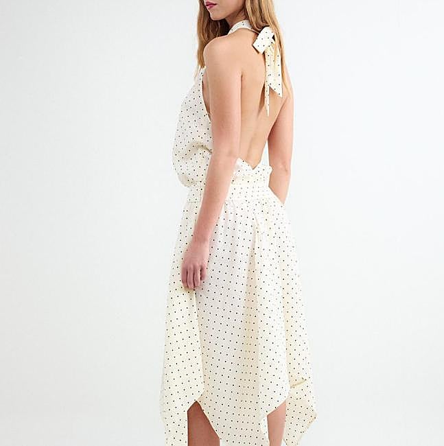 Vestido blanco con lunares pequeños de Balmohk, 35,99 euros.