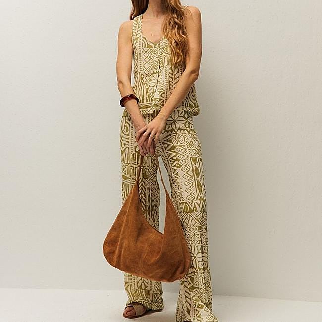 Green-toned printed set from System Action: trousers 49.95 euros and blouse 49.95 euros.