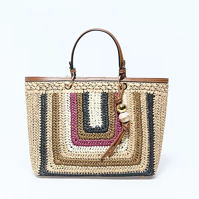 Bolso de rafia de Sfera (25,99 euros)