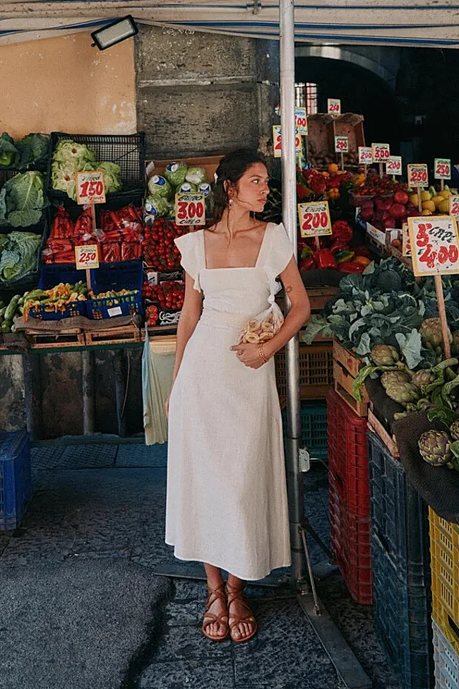 White dress by Hoss Intropia (134 euros)
