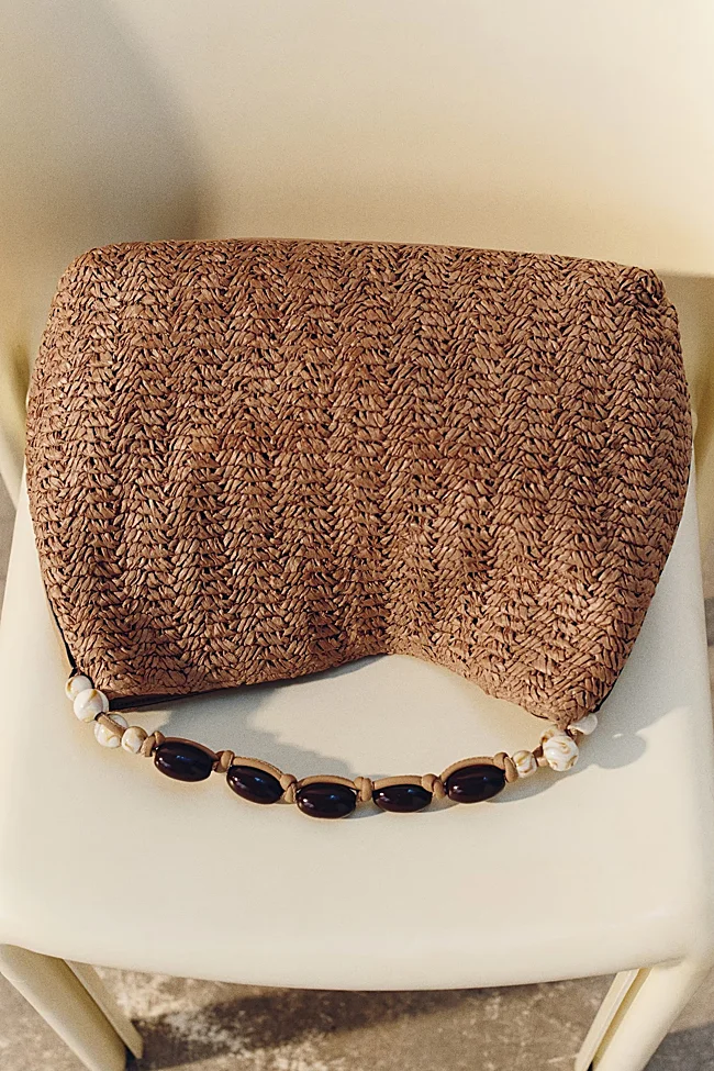 Bolso de rafia de H&M (39,99 euros)