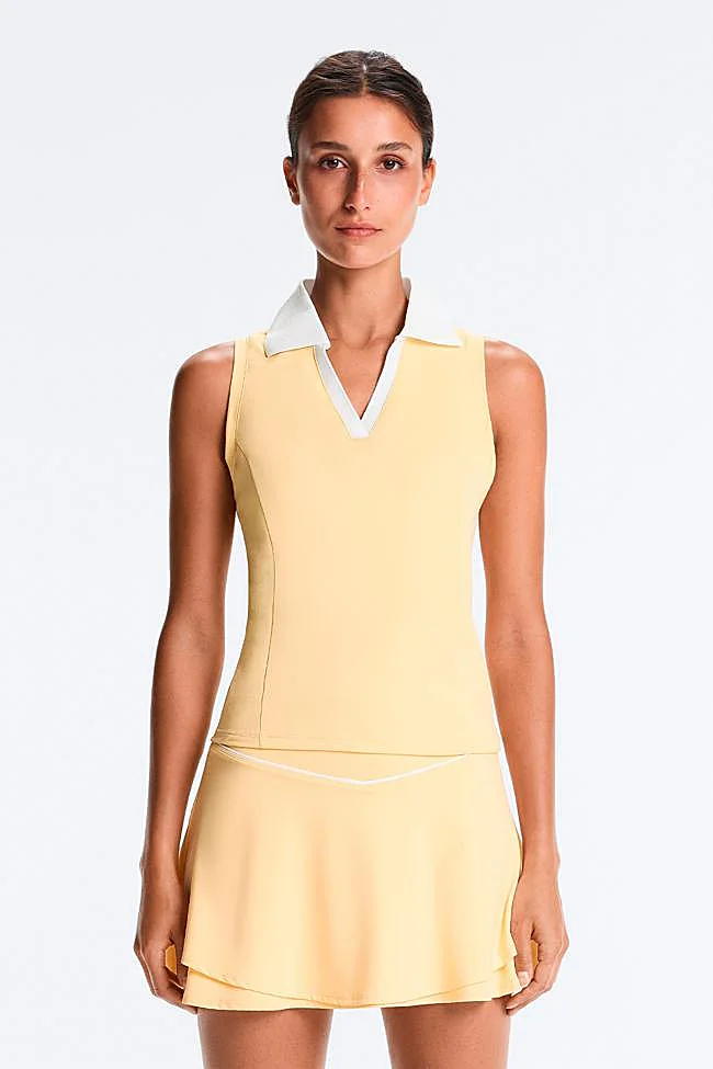 Conjunto de top estilo polo y falda a juego de Oysho.