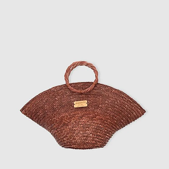Capazo de rafia de Zahati, 145 euros.
