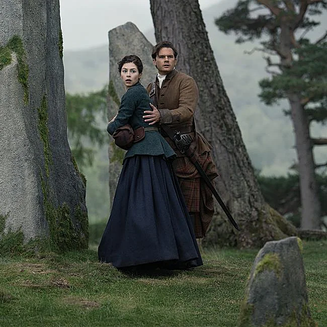Hermione Corfield and Jeremy Irvine are Julia and Henry in Outlander: Blood of My Blood.