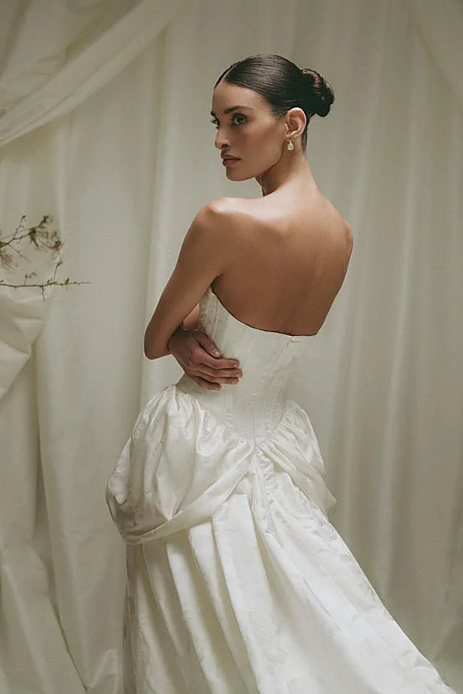 A hairstyle with a bun.