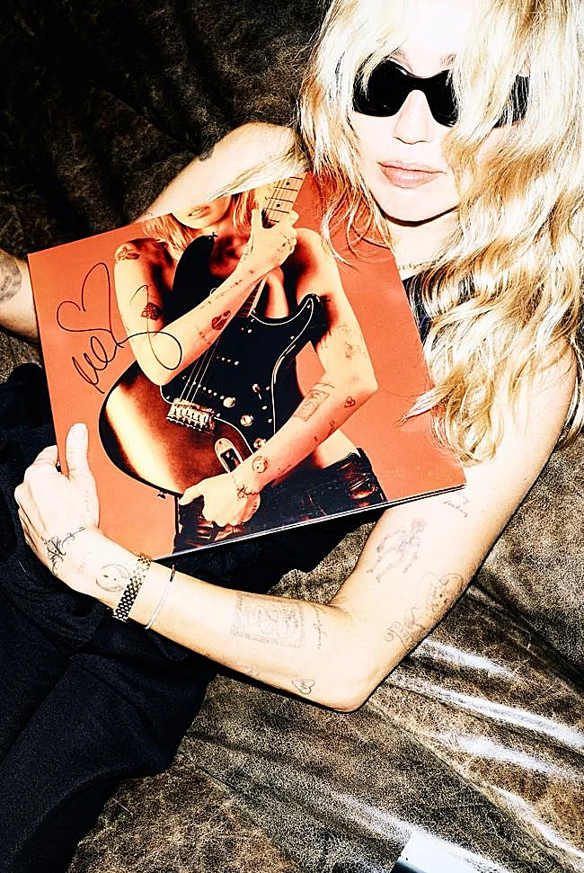 Miley Cyrus with her new album