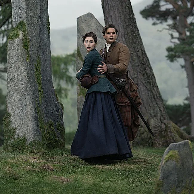 Hermione Corfield as Julia Moriston and Jeremy Irvine as Henry Beauchamp in an image from the second season of Outlander: Blood of My Blood.
