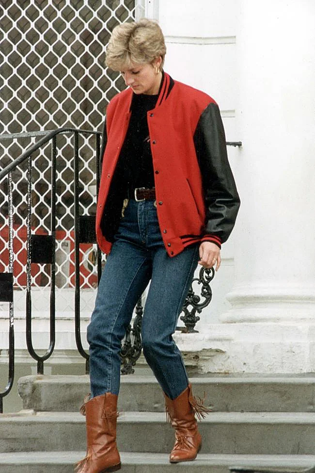 Diana, Princess of Wales, with cowboy boots and a bomber jacket.